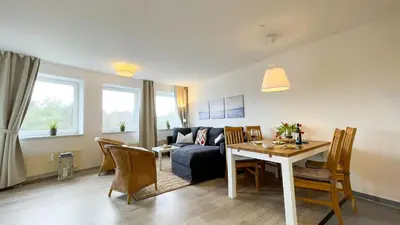 Ein Sitzbereich in der Unterkunft Strandhaus Nordseebrandung Fewo B3.2