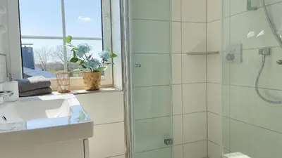 Ein Badezimmer in der Unterkunft Haus Kirsten, Fewo Nr. 5