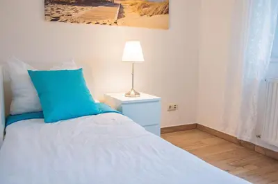 Ein Bett oder Betten in einem Zimmer der Unterkunft Haus Kirsten, Fewo Nr. 2
