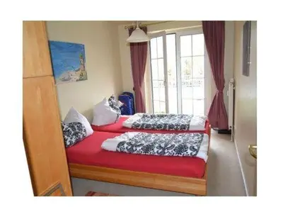 Ein Bett oder Betten in einem Zimmer der Unterkunft Ferienwohnung Elbstrom