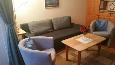 Ein Sitzbereich in der Unterkunft Ferienwohnung Elbstrom