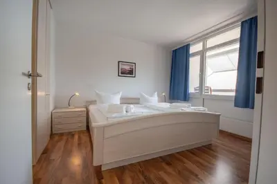 Ein Bett oder Betten in einem Zimmer der Unterkunft Frische Brise 11.06