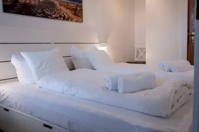Ein Bett oder Betten in einem Zimmer der Unterkunft Frische Brise 10.01