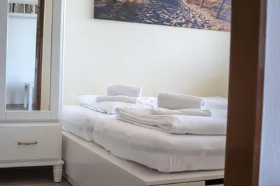 Ein Bett oder Betten in einem Zimmer der Unterkunft Frische Brise 15.09