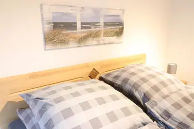 Ein Bett oder Betten in einem Zimmer der Unterkunft Haus Inge