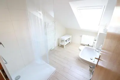 Ein Badezimmer in der Unterkunft Haus Inge
