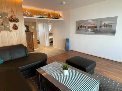 Ein Sitzbereich in der Unterkunft Haus Seehund 15