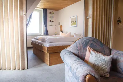 Ein Bett oder Betten in einem Zimmer der Unterkunft Meeresbrandung 36