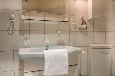 Ein Badezimmer in der Unterkunft Meeresbrandung 36