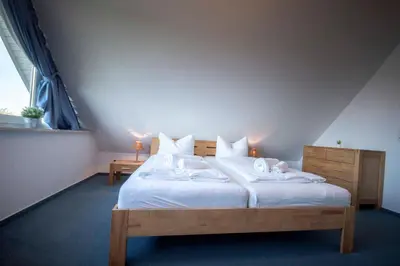 Ein Bett oder Betten in einem Zimmer der Unterkunft Hamburger Straße 7 OG