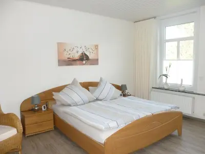 Ein Bett oder Betten in einem Zimmer der Unterkunft Ferienwohnung Plett