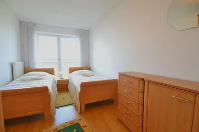 Ein Bett oder Betten in einem Zimmer der Unterkunft Strandpalais, Whg 02