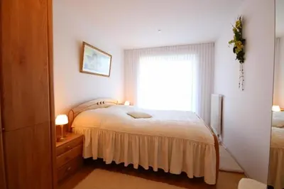 Ein Bett oder Betten in einem Zimmer der Unterkunft Strandpalais, Whg 02