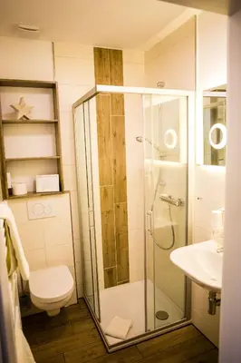 Ein Badezimmer in der Unterkunft Landgasthof 