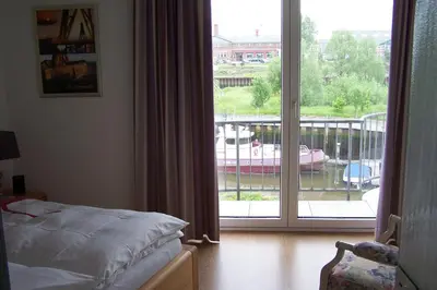 Ein Bett oder Betten in einem Zimmer der Unterkunft Marina 68/70