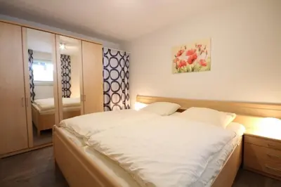 Ein Bett oder Betten in einem Zimmer der Unterkunft Haus Pacific, Whg 82