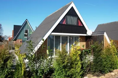 Ein Garten an der Unterkunft Windjammer