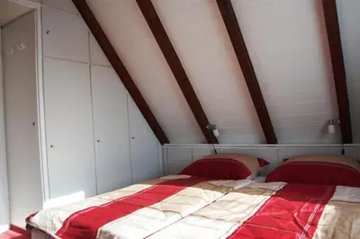 Ein Bett oder Betten in einem Zimmer der Unterkunft Windjammer