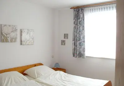 Ein Bett oder Betten in einem Zimmer der Unterkunft Haus Horizont