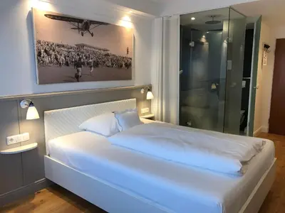 Ein Bett oder Betten in einem Zimmer der Unterkunft Der Kleine Hans - GARDELS Basics