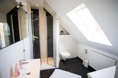 Ein Badezimmer in der Unterkunft Ferienwohnungen in Wremen