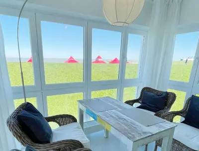 Ein Sitzbereich in der Unterkunft Seaside Apartments Austernbank