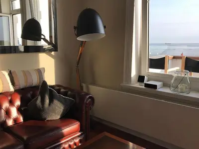 Ein Sitzbereich in der Unterkunft Seaside Apartments Austernbank