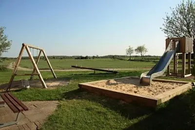 Ein Kinderspielbereich in der Unterkunft Haus Knechtsand, Whg 438