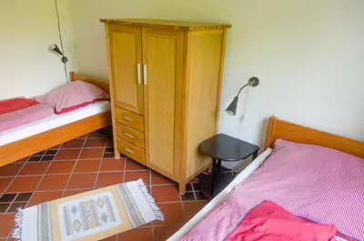 Ein Bett oder Betten in einem Zimmer der Unterkunft Der Deichhof - Ferienwohnungen