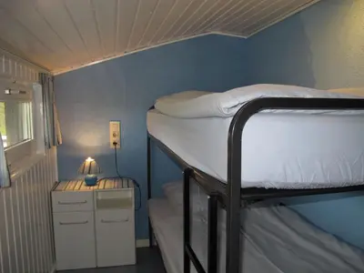 Ein Bett oder Betten in einem Zimmer der Unterkunft Apartment Osterende-1 by Interhome