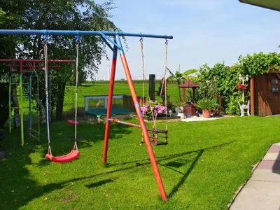 Ein Kinderspielbereich in der Unterkunft Apartment Osterende-2 by Interhome