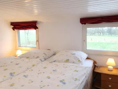 Ein Bett oder Betten in einem Zimmer der Unterkunft Apartment Osterende-3 by Interhome