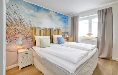 Ein Bett oder Betten in einem Zimmer der Unterkunft Hotel Deichgraf