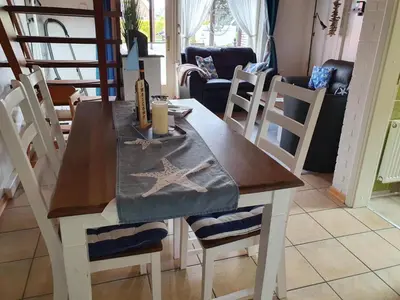 Ein Sitzbereich in der Unterkunft Ferienhäuser Seemannsgarn