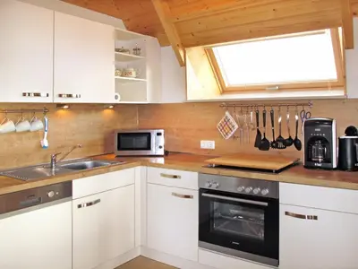 Küche/Küchenzeile in der Unterkunft Holiday Home Cuxland Ferienpark-2 by Interhome