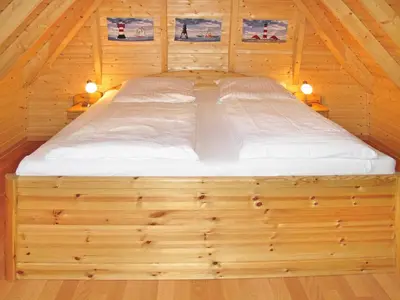 Ein Bett oder Betten in einem Zimmer der Unterkunft Holiday Home Cuxland Ferienpark-2 by Interhome