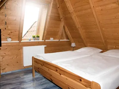 Ein Bett oder Betten in einem Zimmer der Unterkunft Holiday Home Cuxland Ferienpark-3 by Interhome