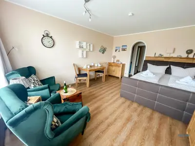 Ein Bett oder Betten in einem Zimmer der Unterkunft Urlaub in 1. Strandreihe