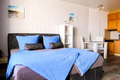 Ein Bett oder Betten in einem Zimmer der Unterkunft Haus Atlantic Whg. 607A