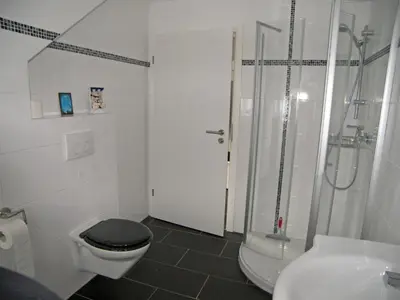Ein Badezimmer in der Unterkunft Ferienhaus Regenbogen