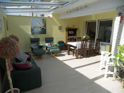 Ein Sitzbereich in der Unterkunft Ferienhaus Regenbogen
