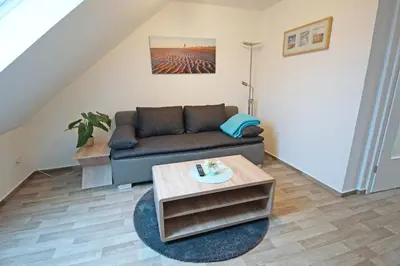 Ein Sitzbereich in der Unterkunft Ferienwohnung Am Steinkamp