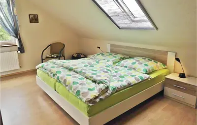 Ein Bett oder Betten in einem Zimmer der Unterkunft Nice Apartment In Osterbruch With Wifi