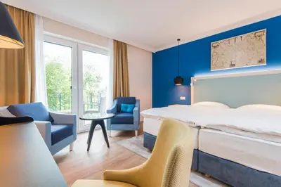 Ein Bett oder Betten in einem Zimmer der Unterkunft Boutique-Hotel Zur alten Post