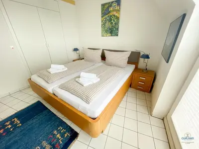 Ein Bett oder Betten in einem Zimmer der Unterkunft Urlaub direkt in der City Marina
