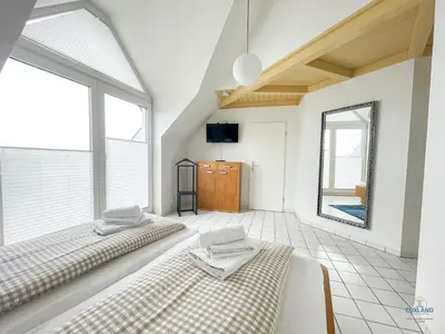 Ein Bett oder Betten in einem Zimmer der Unterkunft Urlaub direkt in der City Marina