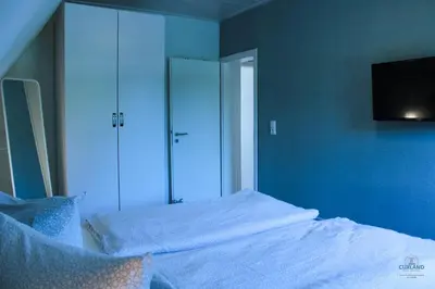 Ein Bett oder Betten in einem Zimmer der Unterkunft Ferienwohnung Schmidt