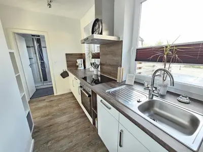 Küche/Küchenzeile in der Unterkunft Appartementhaus Kogge Wohnung 4