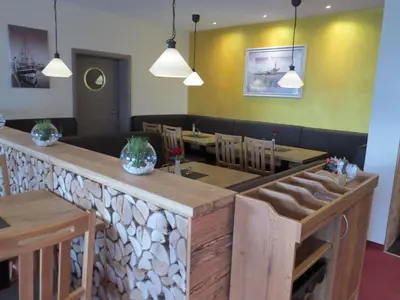 Ein Sitzbereich in der Unterkunft Nordseehotel Eymers