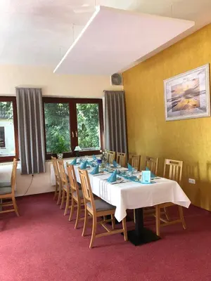 Ein Sitzbereich in der Unterkunft Nordseehotel Eymers
